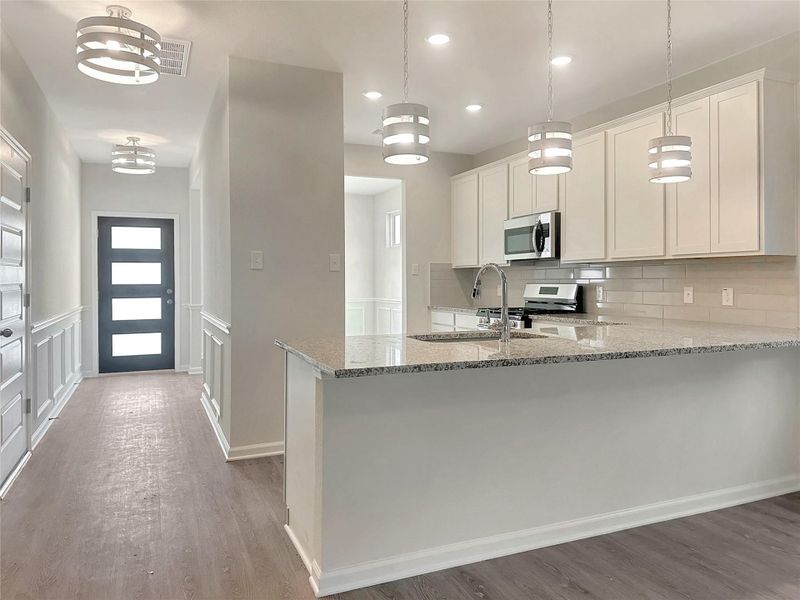 The Caldwell- Kitchen. Home is under construction. Sample image for illustration; upgrades, options, and colors may vary.