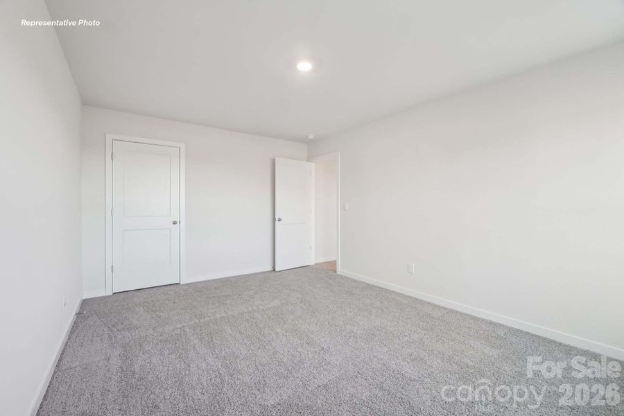 Spacious, unfurnished interior of a new home in Sanctuary at Southgate, Indian Trail (Image 33).