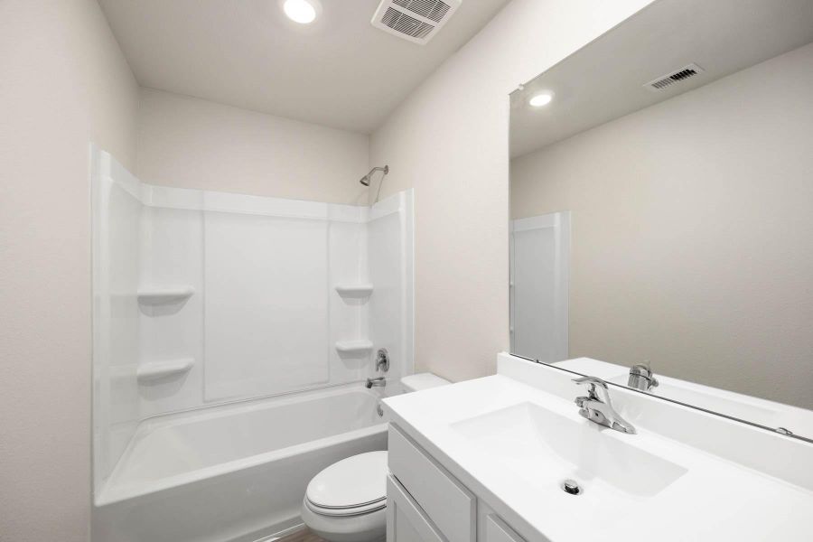 Furnished interior view inside a new home in Vacek Country Meadows, Richmond (Image 6).