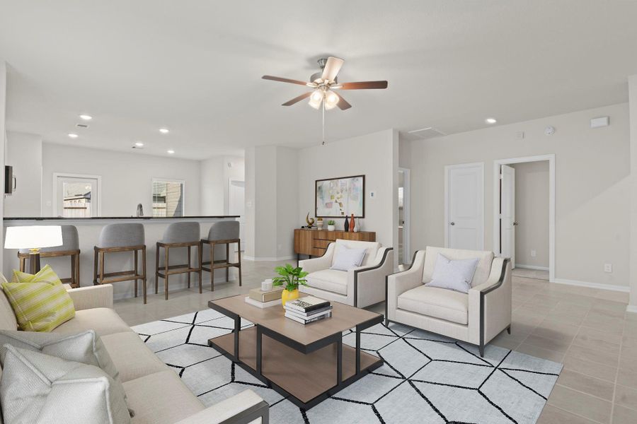 Virtually staged to showcase its potential, this bright and spacious family room flows beautifully into the kitchen and dining areas. Large windows bring in an abundance of natural light, while tile flooring adds elegance and easy maintenance—perfect for relaxing or entertaining.