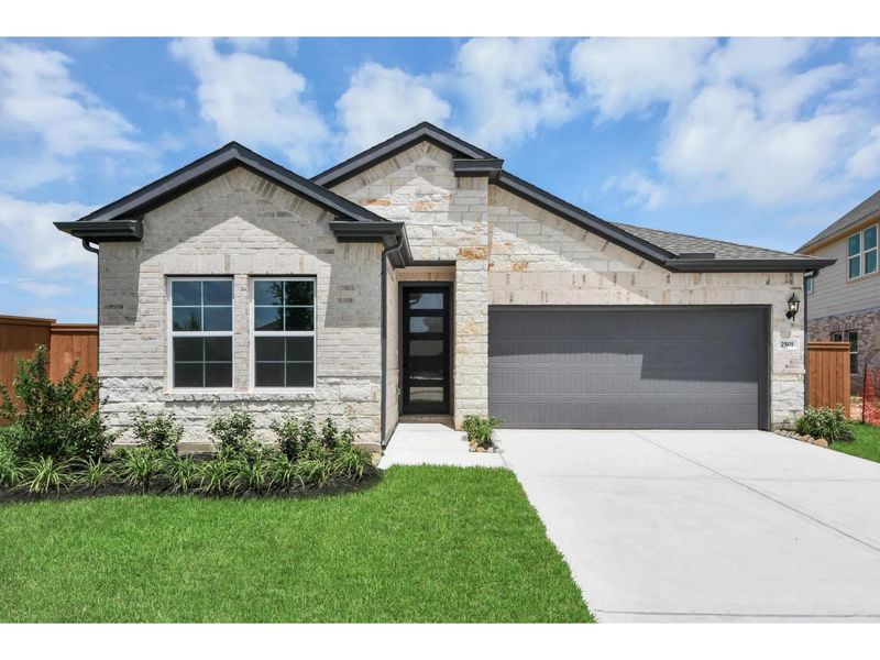 Front exterior of a new home in Sunterra, Katy, TX, highlighting curb appeal (Image 1). Front exterior of a new home in Sunterra, Katy, TX, highlighting curb appeal (Image 1).