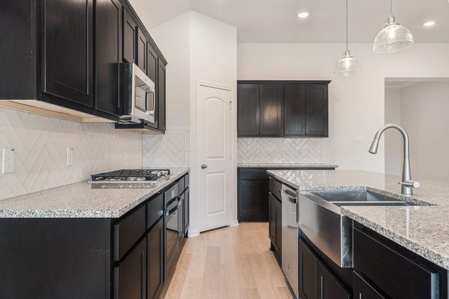 Furnished interior view inside a new home in Deer Pines, Conroe (Image 12).