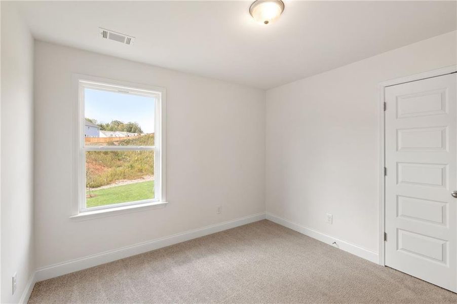 Spacious, unfurnished interior of a new home in Clark Farms, Flowery Branch (Image 19).