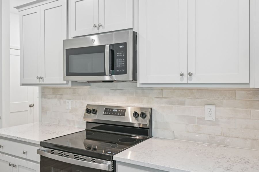 Representative furnished interior of a home built from the Brooke by Ashton Woods in Middleton Farms, Middlesex (Image 4).
