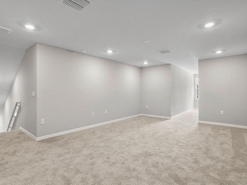 The spacious 2nd story loft provides versatile space to use as suits your needs - Willow II with Loft by Highland Homes The spacious 2nd story loft provides versatile space to use as suits your needs - Willow II with Loft by Highland Homes