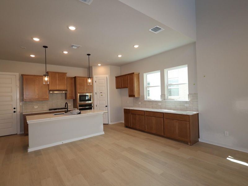 Furnished interior view inside a new home in Heritage, Dripping Springs (Image 5).