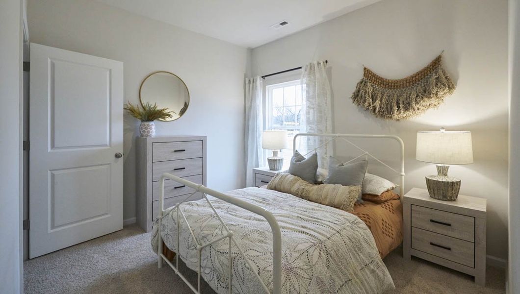 Representative furnished interior of a home built from the CALI by D.R. Horton in Raven Ridge, Lexington (Image 7).