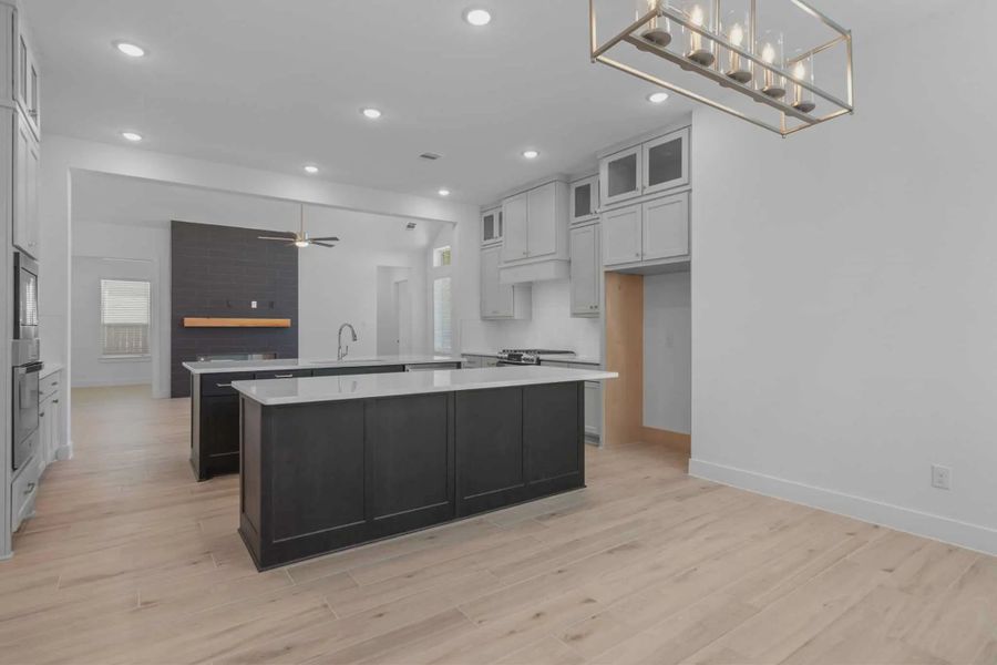 Representative furnished interior of a home built from the Lakeway by Chesmar Homes in Meridiana 50's, Manvel (Image 12).
