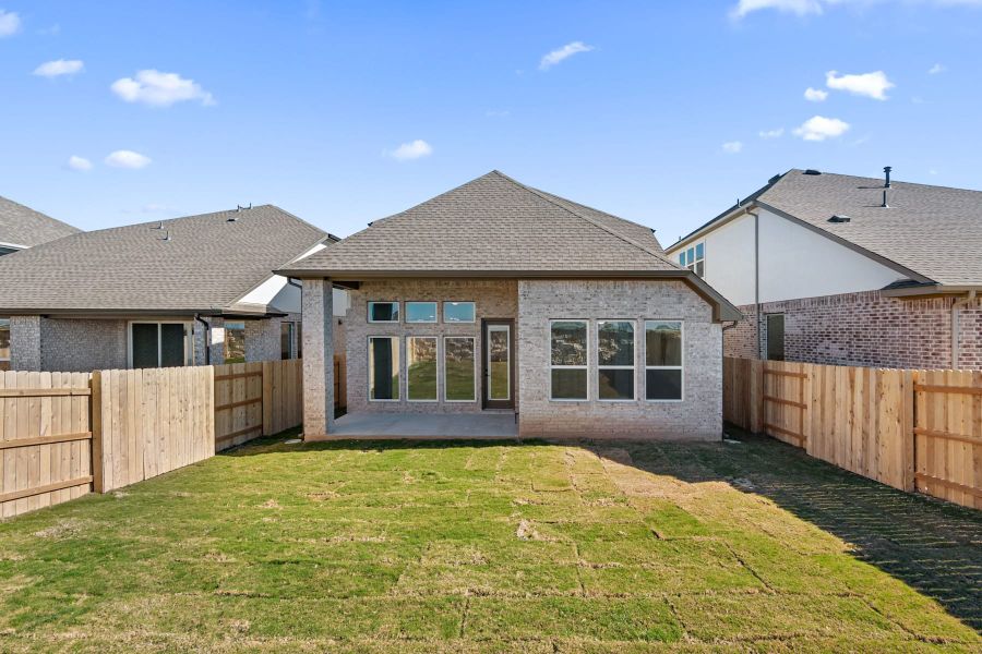 Exterior details and patio area of a home in Flora, Hutto (Image 25).