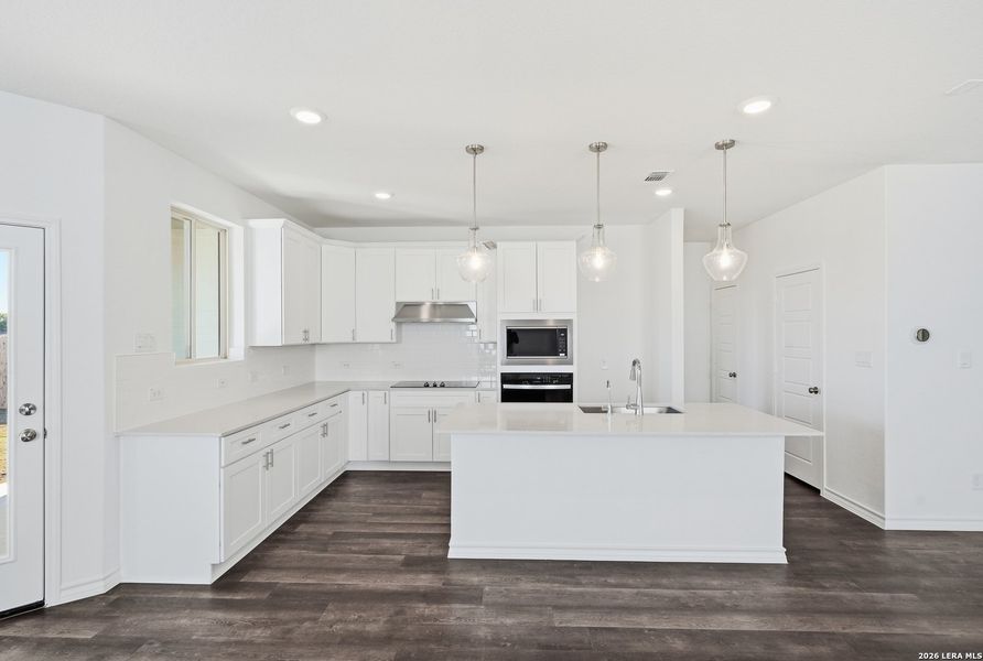 Furnished interior view inside a new home in Nopal Valley, San Antonio (Image 4).