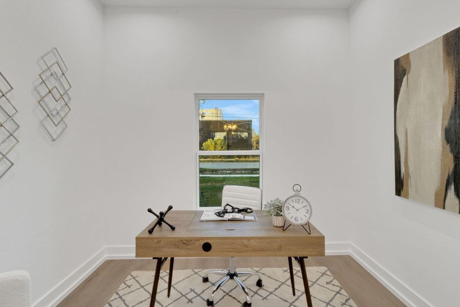 Dedicated office space with serene views and plenty of natural light. Dedicated office space with serene views and plenty of natural light.