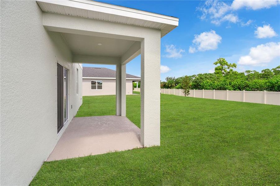 Exterior details and patio area of a home in Brack Ranch, St. Cloud (Image 2). Exterior details and patio area of a home in Brack Ranch, St. Cloud (Image 2).