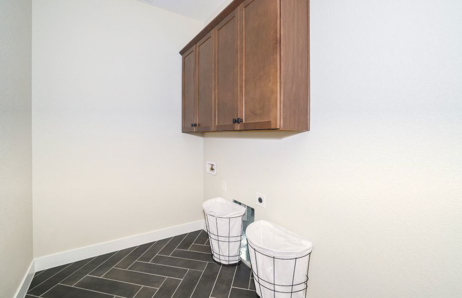 Furnished interior view inside a new home in Hilltop at Inspiration, Aurora (Image 11).