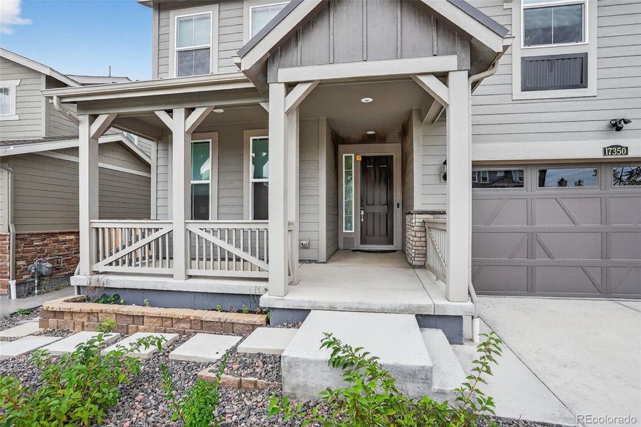 Front exterior of a new home in , Parker, CO, highlighting curb appeal (Image 21).