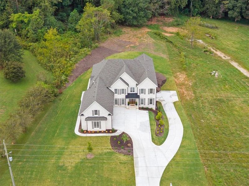 Front exterior of a new home in , Canton, GA, highlighting curb appeal (Image 29).