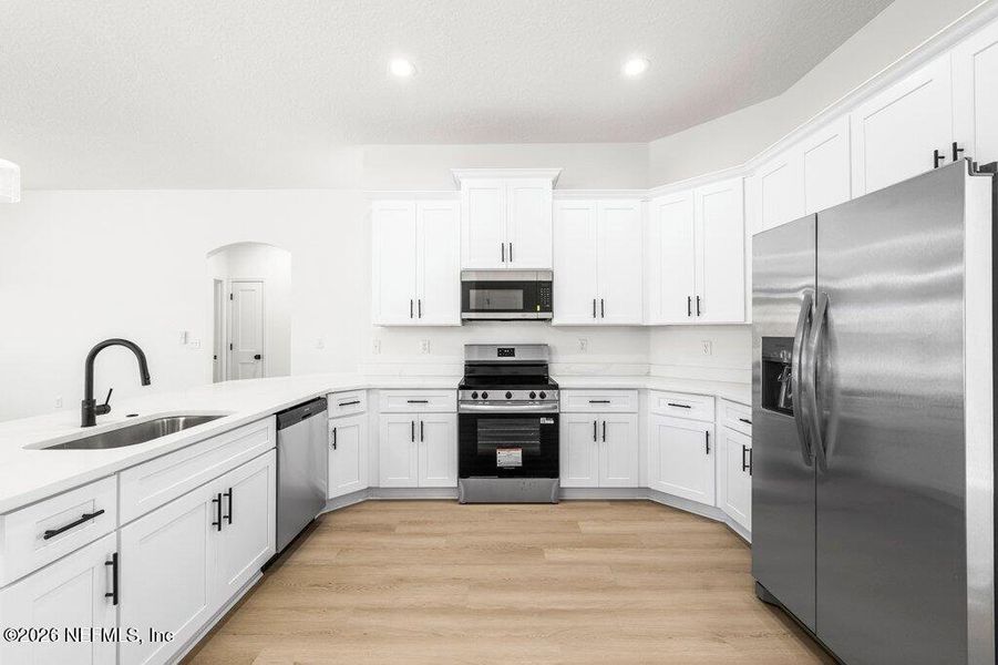 Furnished interior view inside a new home in , Glen St. Mary (Image 5).