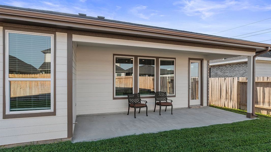 Representative exterior photo of a completed home built from the LORENZO by D.R. Horton in Alexander, Pearland, TX (Image 18).