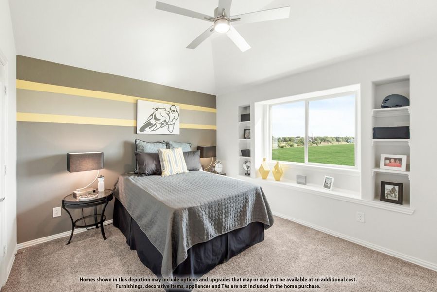 Bedroom with vaulted ceiling, ceiling fan, built-in shelves, and large window with yard view