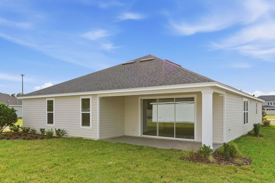 Exterior details and patio area of a home in Headwaters at Lofton Creek, Yulee (Image 22).
