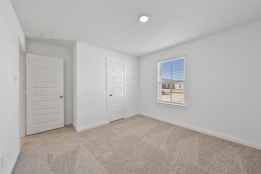 Spacious, unfurnished interior of a new home in Tamarron, Fulshear (Image 23). Spacious, unfurnished interior of a new home in Tamarron, Fulshear (Image 23).