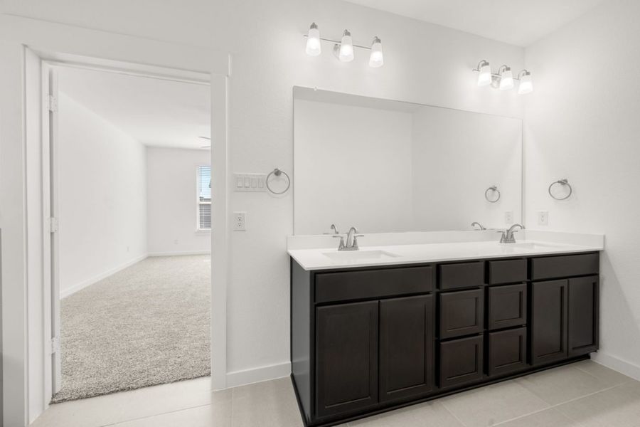 Representative furnished interior of a home built from the Hunters Crossing Ironwood 2589 by Brohn Homes in Hunters Crossing, Sealy (Image 8).