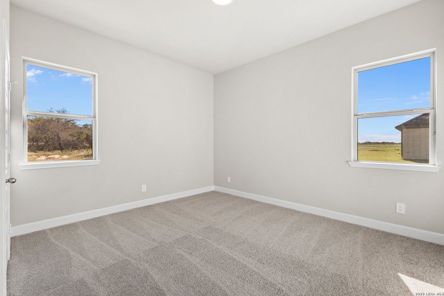Spacious, unfurnished interior of a new home in Pradera Ridge, Floresville (Image 12).