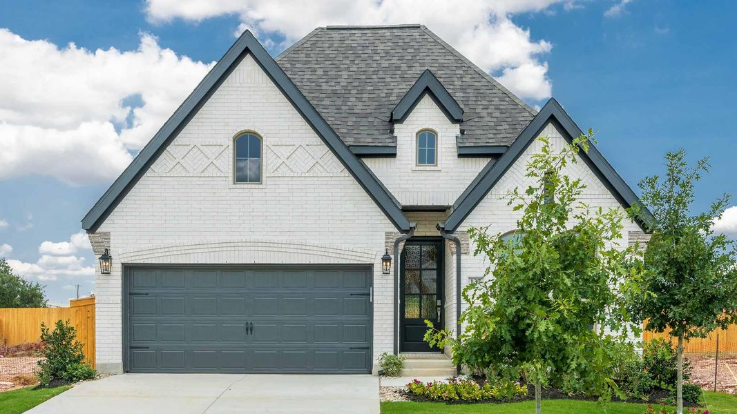 Front exterior of a new home in , Georgetown, TX, highlighting curb appeal (Image 2). Front exterior of a new home in , Georgetown, TX, highlighting curb appeal (Image 2).