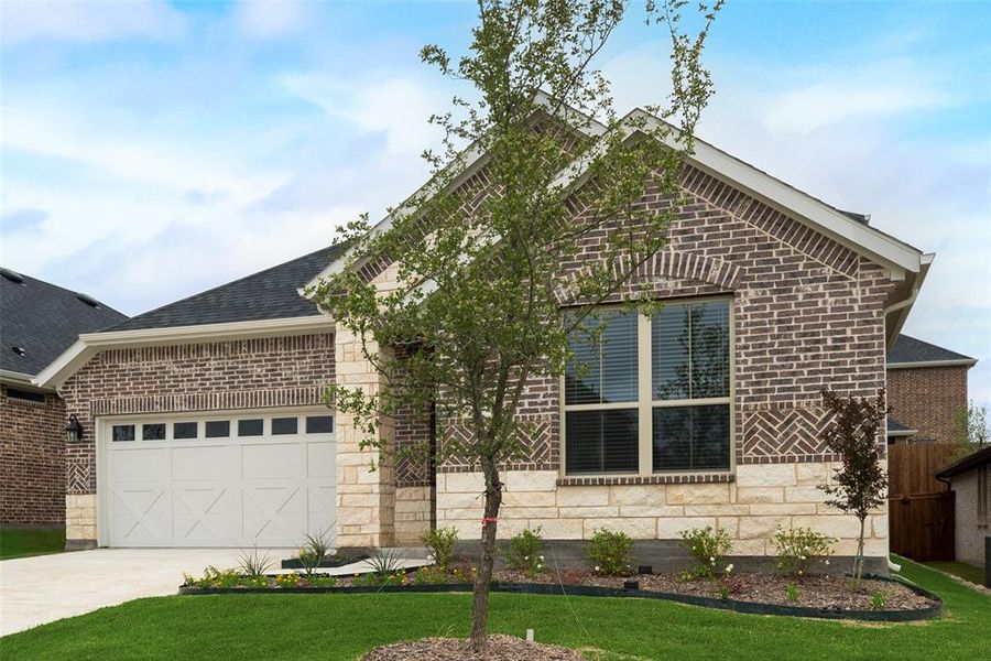 Front exterior of a new home in Villages of Hurricane Creek, Anna, TX, highlighting curb appeal (Image 17).