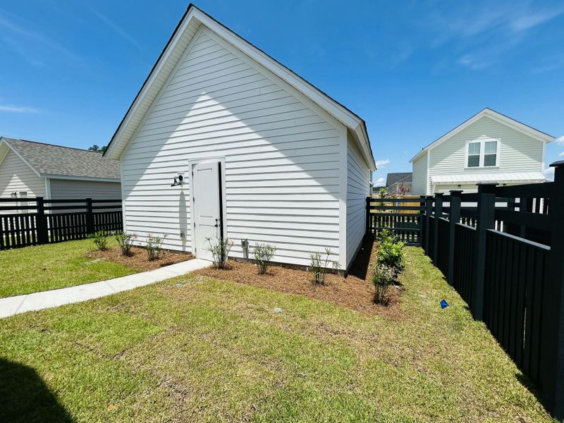 Exterior details and patio area of a home in The Domus Collection at Midtown Nexton, Summerville (Image 3).