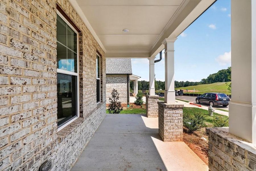 Exterior details and patio area of a home in Nichols Farm, Dacula (Image 28).