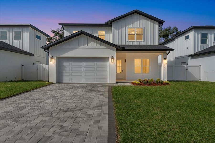 Front exterior of a new home in , Seminole, FL, highlighting curb appeal (Image 26). Front exterior of a new home in , Seminole, FL, highlighting curb appeal (Image 26).