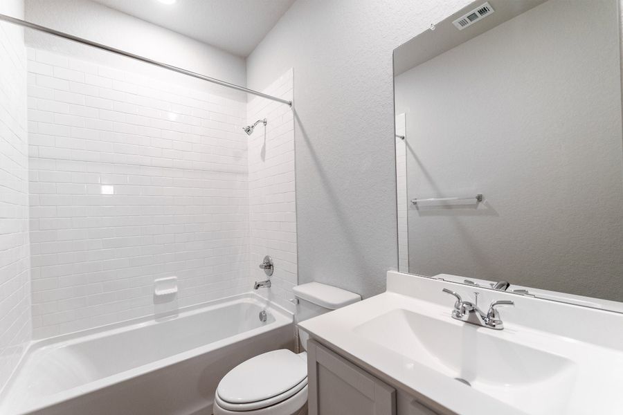 Furnished interior view inside a new home in Hennersby Hollow, San Antonio (Image 7).