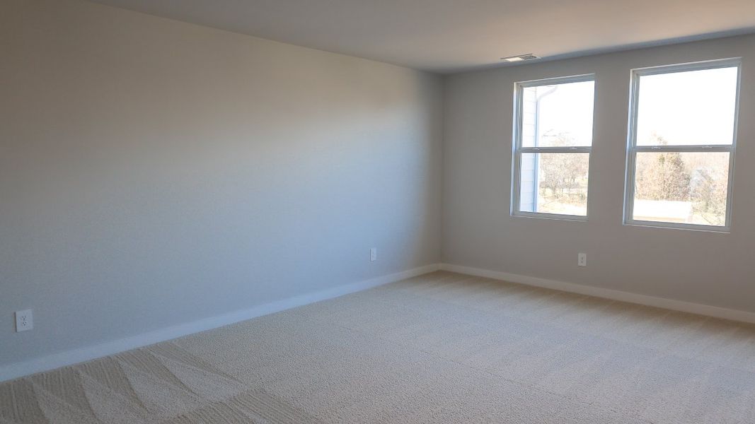 Representative unfurnished interior of a home built from the TISDALE by D.R. Horton in Harvest Point, Spring Hill (Image 55).