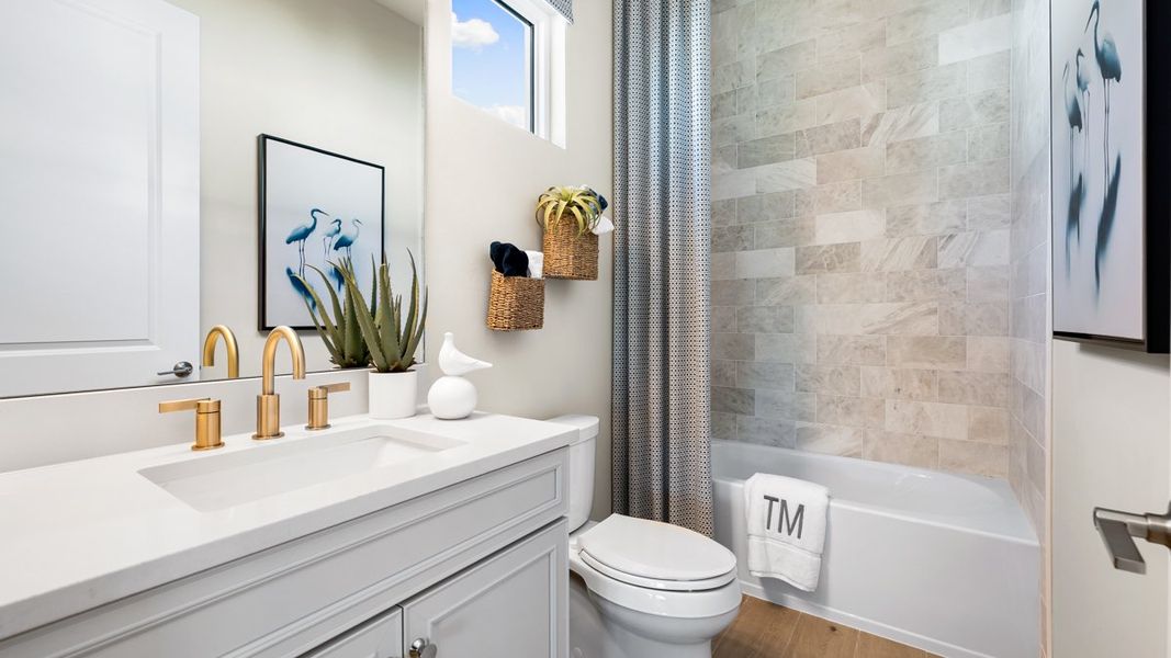 Representative furnished interior of a home built from the Pallazio II by Taylor Morrison in Esplanade by the Islands, Naples (Image 26).