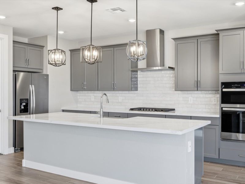Furnished interior view inside a new home in Legacy Place, Glendale (Image 3).