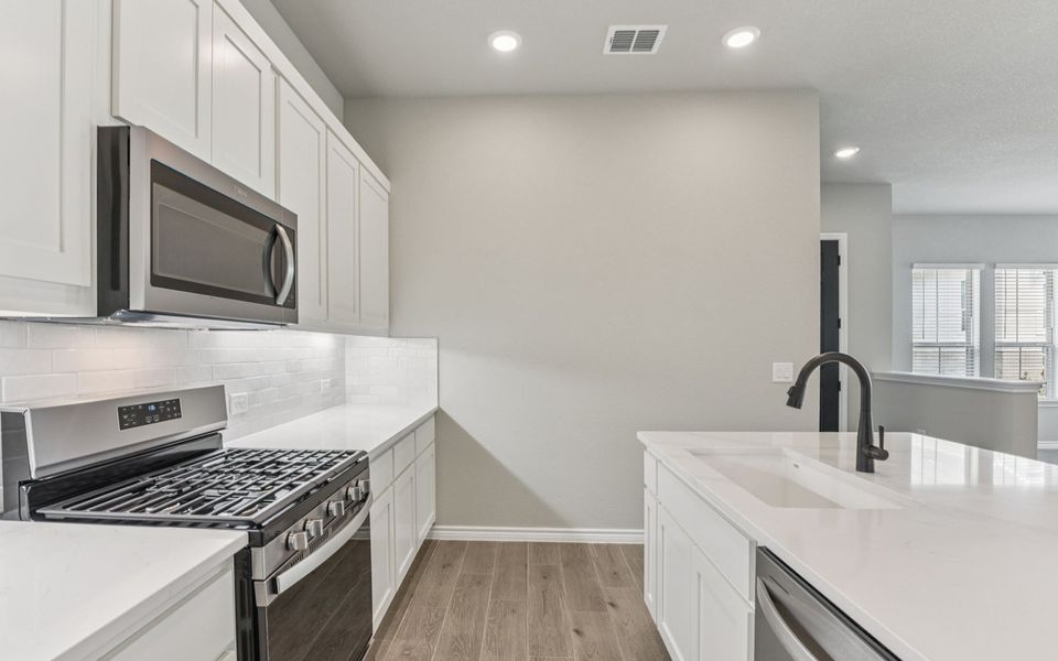 Furnished interior view inside a new home in Kissing Tree, San Marcos (Image 6).