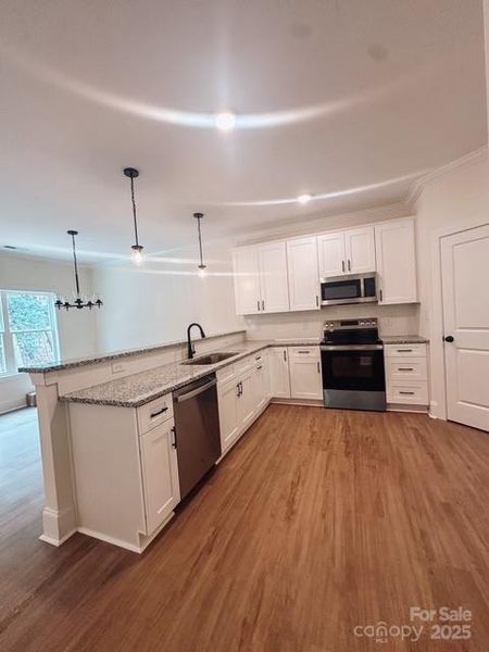Furnished interior view inside a new home in , Monroe (Image 4).