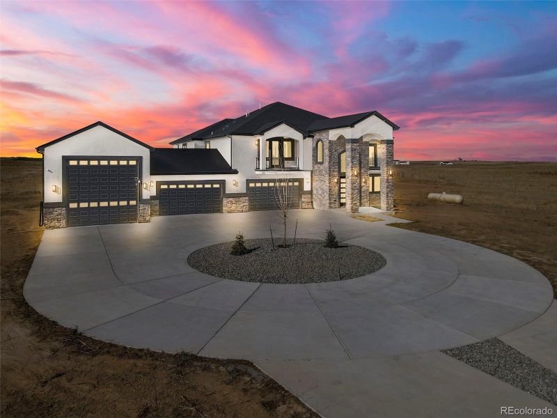 Front exterior of a new home in , Hudson, CO, highlighting curb appeal (Image 27).
