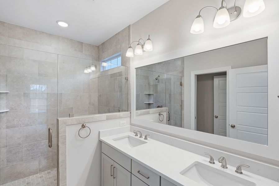 Representative furnished interior of a home built from the Kauai by Bill Clark Homes in The Sanctuary at Sunset Beach, Sunset Beach (Image 16).