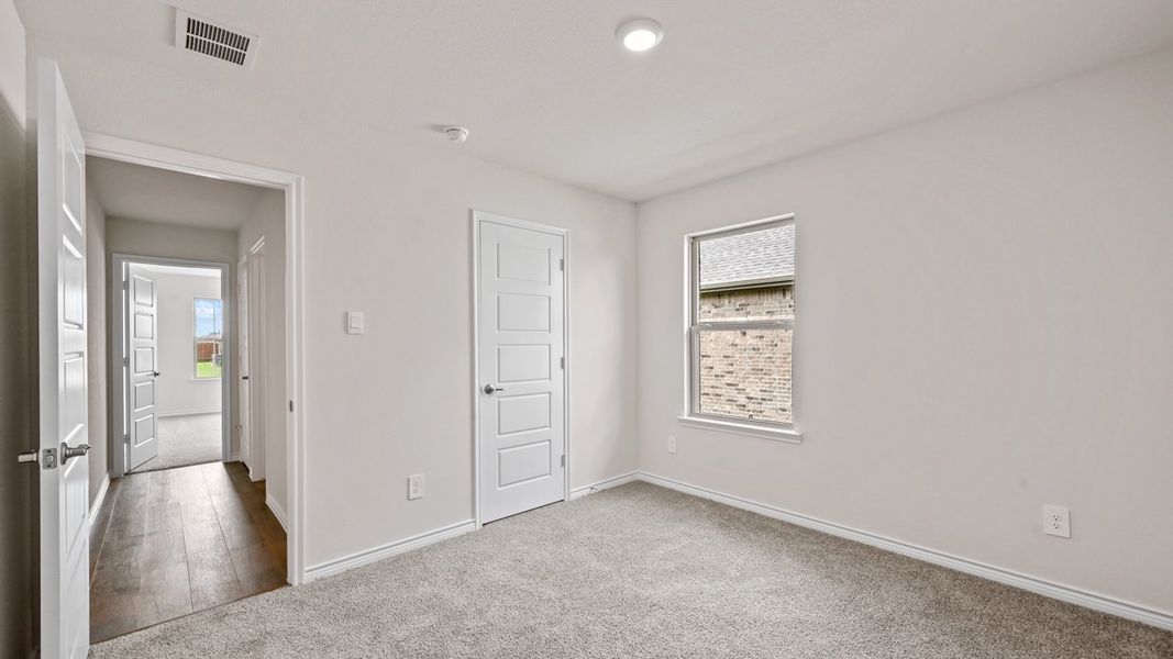 Spacious, unfurnished interior of a new home in Fireside by the Lake, Garland (Image 25).