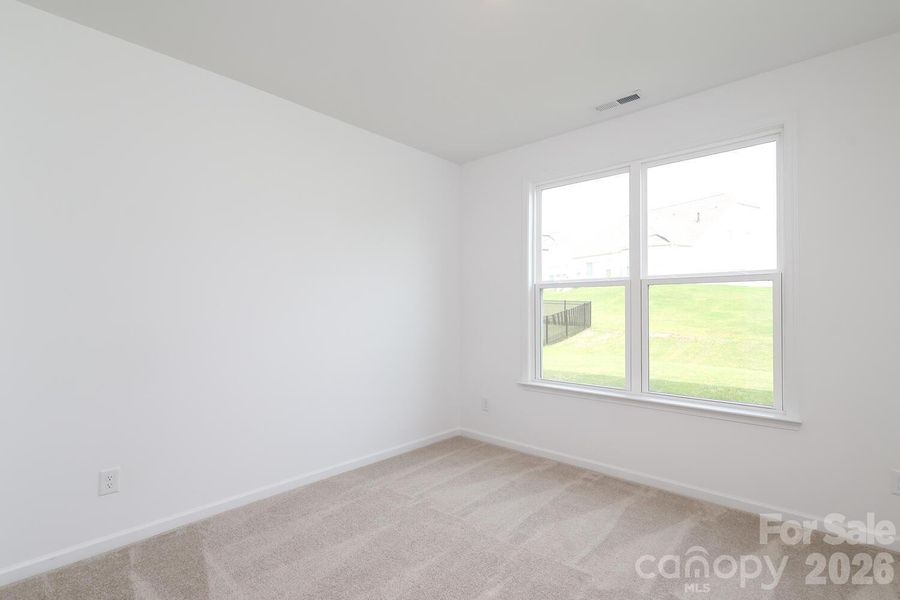 Spacious, unfurnished interior of a new home in Estates at Sugar Creek, Indian Land (Image 31).