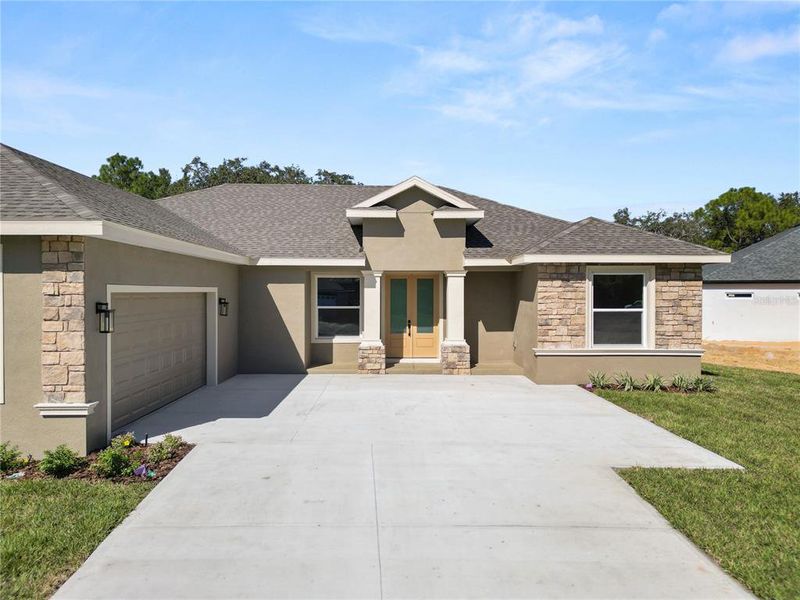 Front exterior of a new home in , Sebring, FL, highlighting curb appeal (Image 25). Front exterior of a new home in , Sebring, FL, highlighting curb appeal (Image 25).