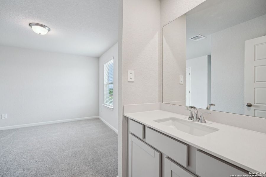 Furnished interior view inside a new home in Sagebrooke - Premier Series, San Antonio (Image 10). Furnished interior view inside a new home in Sagebrooke - Premier Series, San Antonio (Image 10).