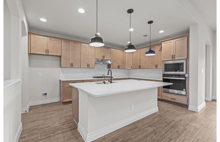 Furnished interior view inside a new home in Bison Ridge, San Antonio (Image 2). Furnished interior view inside a new home in Bison Ridge, San Antonio (Image 2).