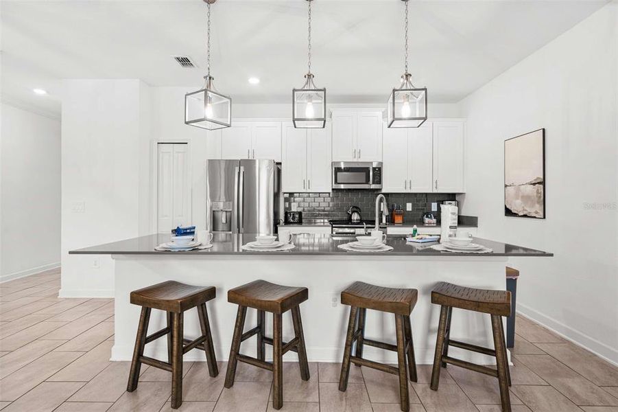 Furnished interior view inside a new home in , Kissimmee (Image 21). Furnished interior view inside a new home in , Kissimmee (Image 21).