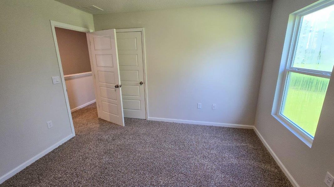 Spacious, unfurnished interior of a new home in Misting Springs, Crawfordville (Image 11).