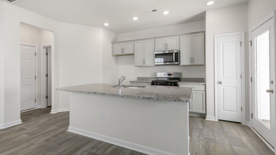 Furnished interior view inside a new home in The Townes at Galvins Ridge, Sanford (Image 3).