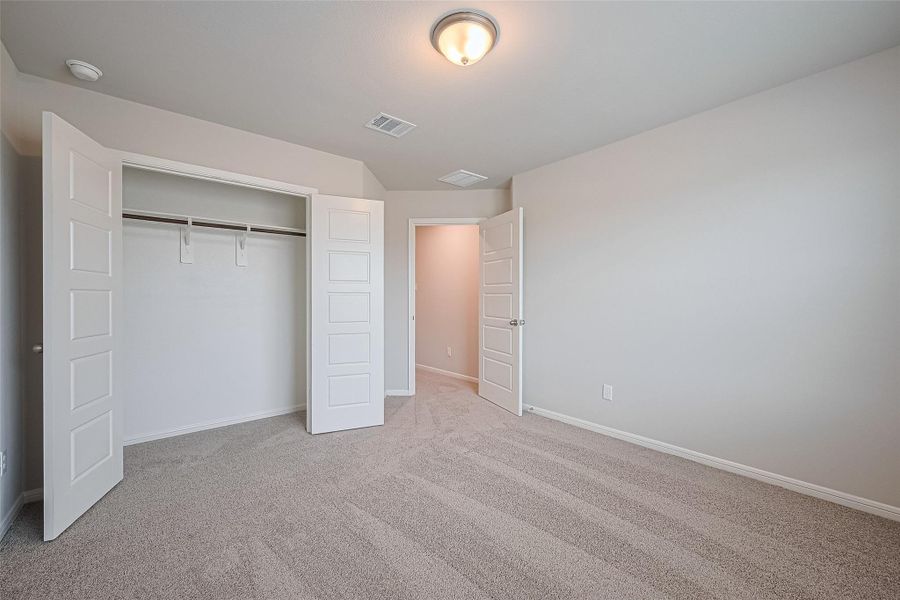 Spacious, unfurnished interior of a new home in Sunterra, Katy (Image 18).