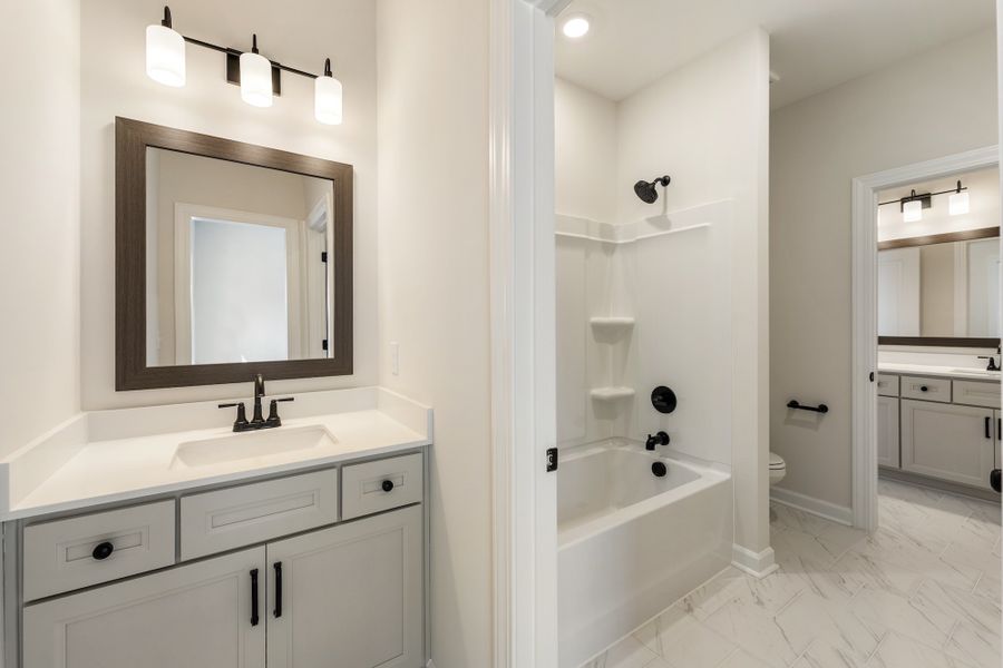 Furnished interior view inside a new home in Landing at Pine Lake, Anderson (Image 14).