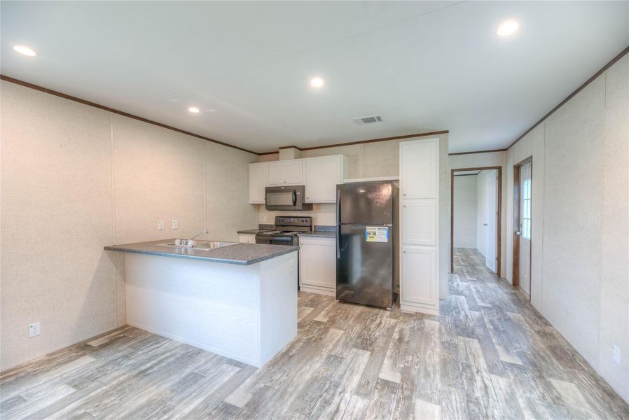 Furnished interior view inside a new home in , Livingston (Image 4).